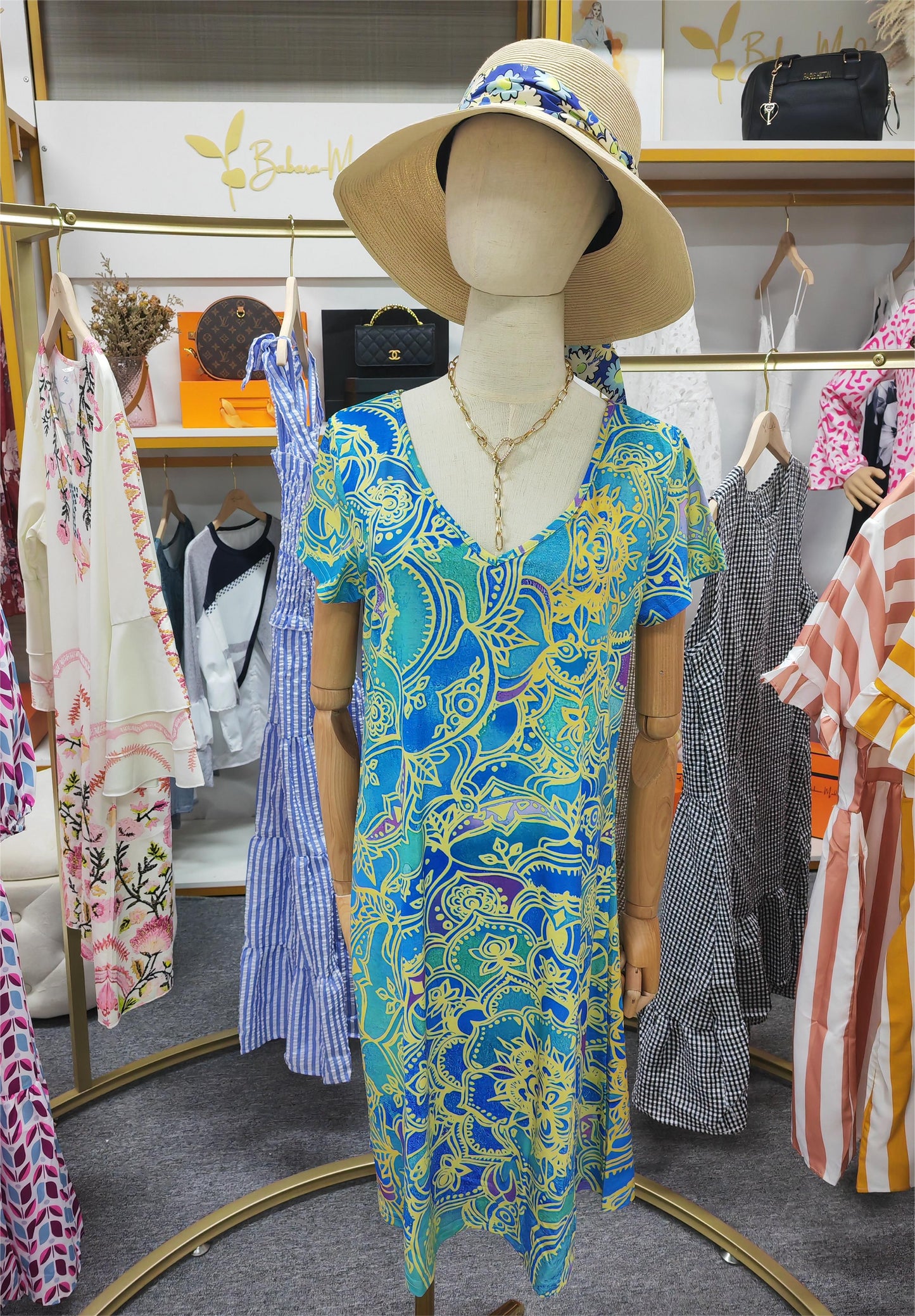 CM | Minivestido azul océano hasta la rodilla con estampado de mandala y manga corta