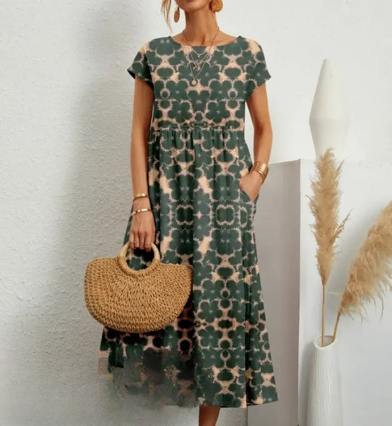 CM | Elegante vestido midi con estampado floral