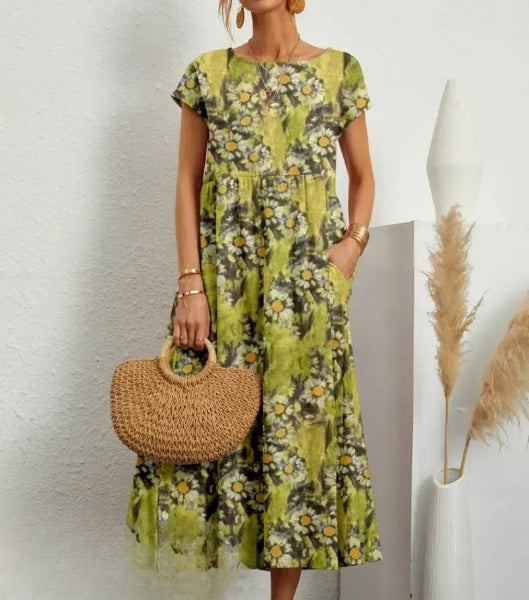 CM | Elegante vestido midi con estampado floral