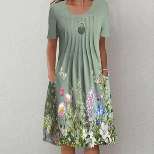 CM | Mini vestido con pliegues y estampado floral
