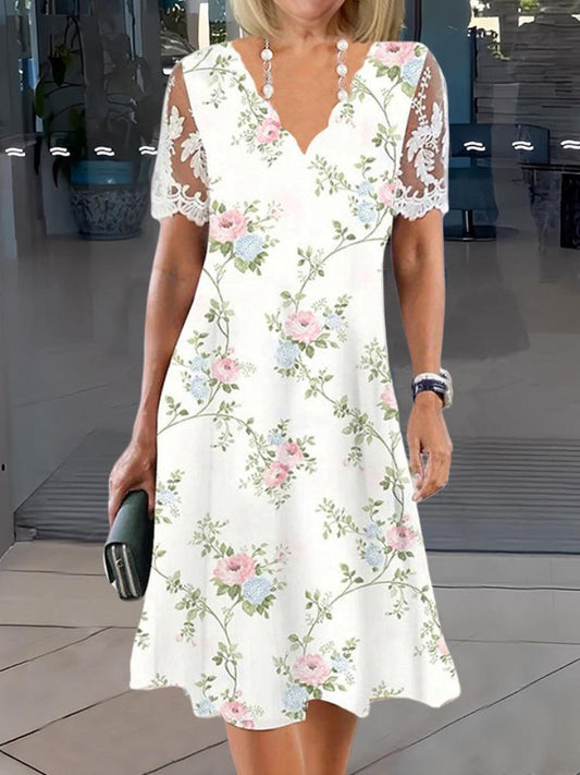 CM | Estiloso mini vestido de manga corta con escote en V