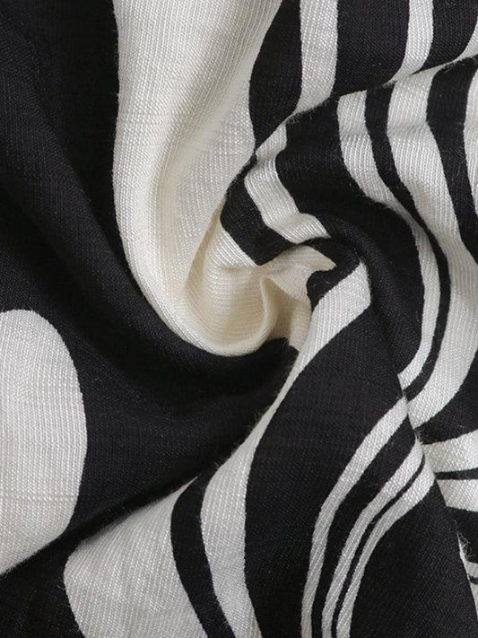 CM | Chic mini vestido negro de manga larga