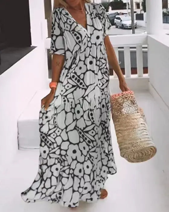 CM | 2024 AliExpress Mujeres Europeas y Americanas Cross border Verano Nueva Moda Impreso Manga Corta Profundo Cuello en V Vestido Largo