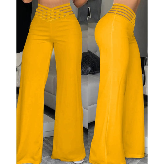 CM | Pantalones acampanados de elastano con cintura cruzada