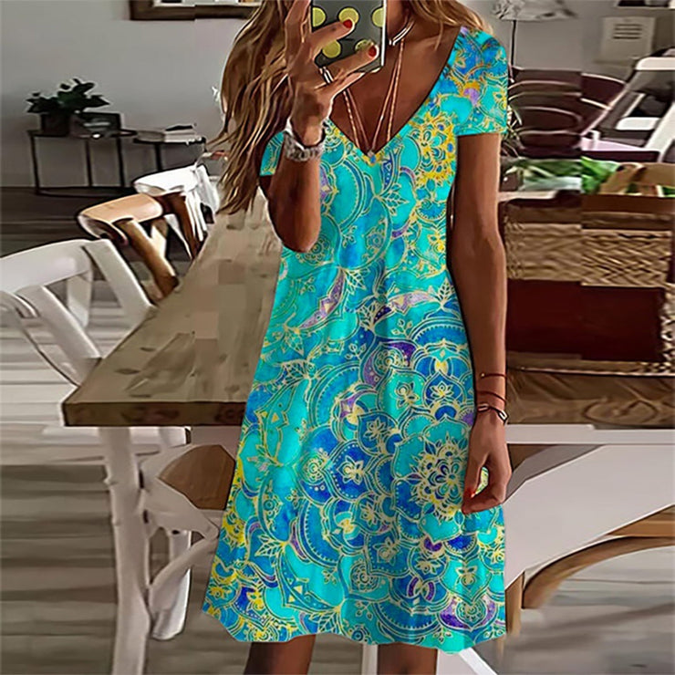 CM | Minivestido azul océano hasta la rodilla con estampado de mandala y manga corta