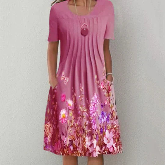 CM | Mini vestido con pliegues y estampado floral
