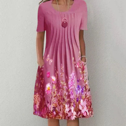 CM | Mini vestido con pliegues y estampado floral