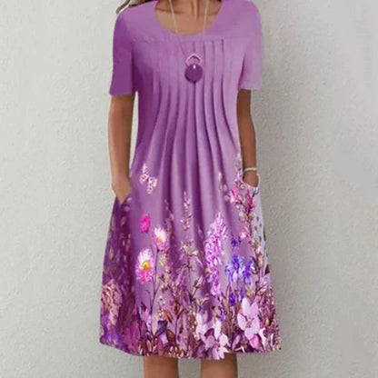 CM | Mini vestido con pliegues y estampado floral